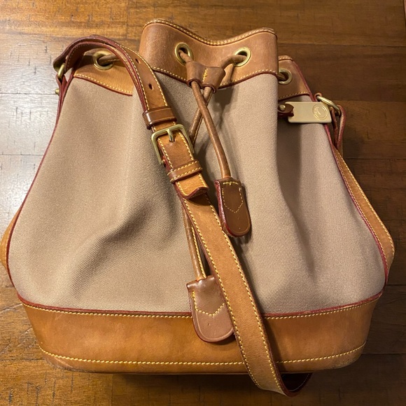 Dooney & Bourke Handbags - Dooney & Bourke Tan and Beige Leather-Trim Drawstring Shoulder Bag